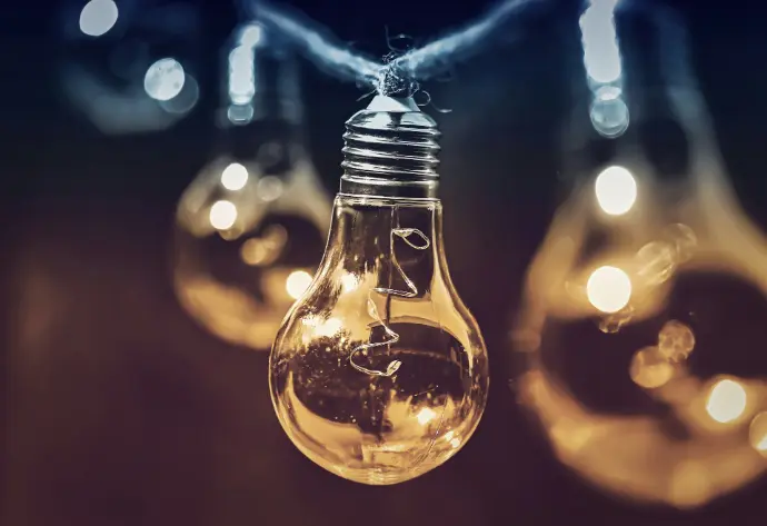 selective focus photography of light bulb
